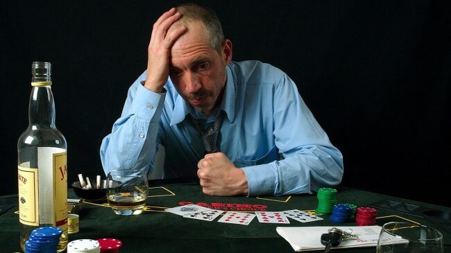 What are the complications and negative effects of gambling addiction
